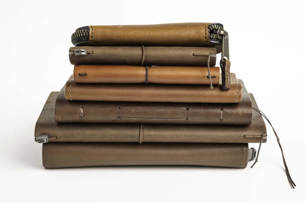 A Stack of Leather-Bound Journals, Notebooks, Wallets & Cases — стоковое фото