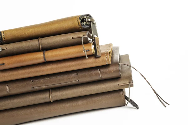 A Stack of Leather-Bound Journals, Notebooks, Wallets & Cases — стоковое фото