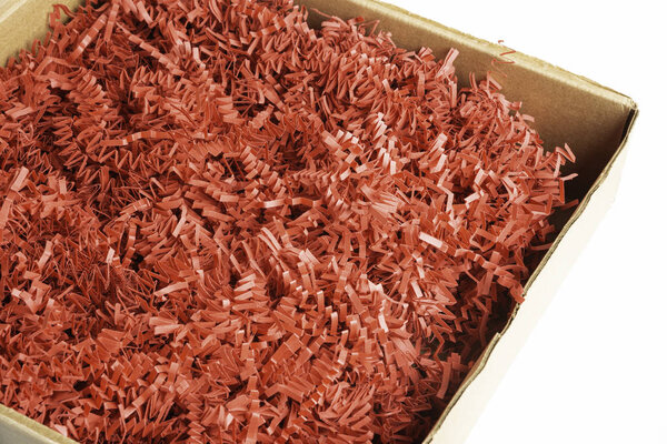 Package Box With Red Paper Strips Filling