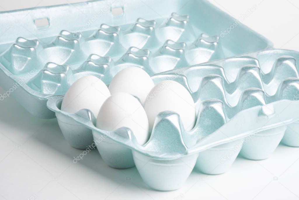 Four Eggs On A Styrofoam Tray