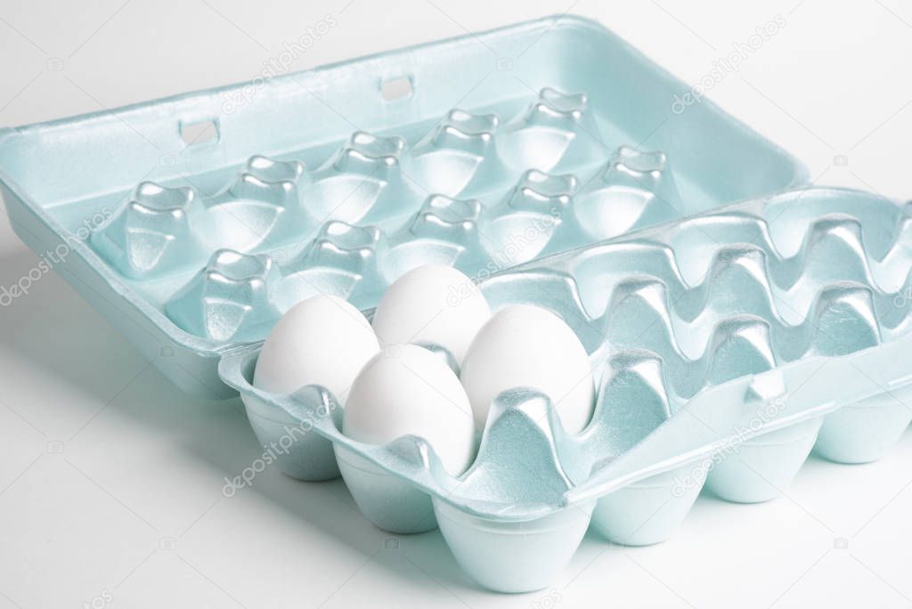 Four Eggs On A Styrofoam Tray