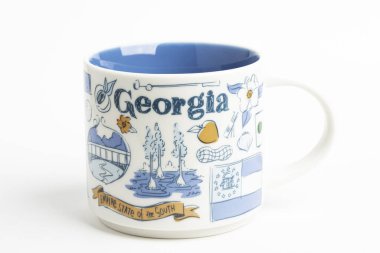 A Starbucks Signature Mug With Georgia Iconic Designs