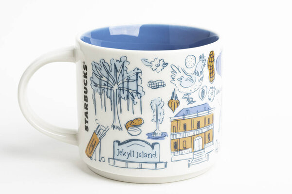 A Starbucks Signature Mug With Georgia Iconic Designs