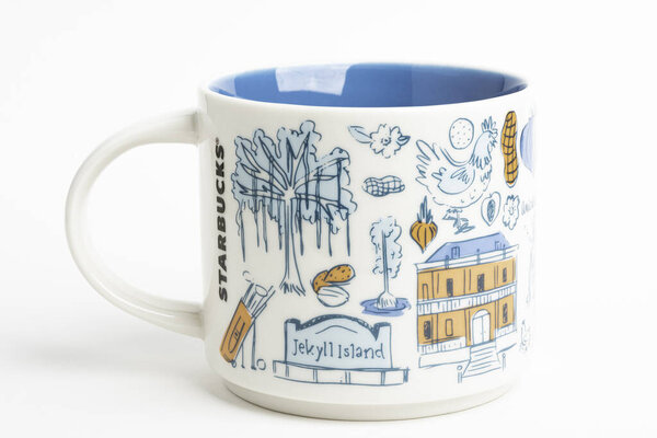 A Starbucks Signature Mug With Georgia Iconic Designs