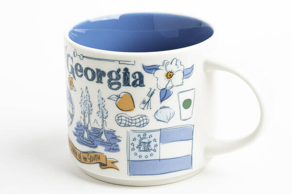 A Starbucks Signature Mug With Georgia Iconic Designs