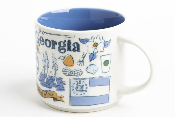 A Starbucks Signature Mug With Georgia Iconic Designs