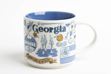 A Starbucks Signature Mug With Georgia Iconic Designs