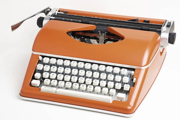 Tragbare manuelle Schreibmaschine in rot orange — Stockfoto