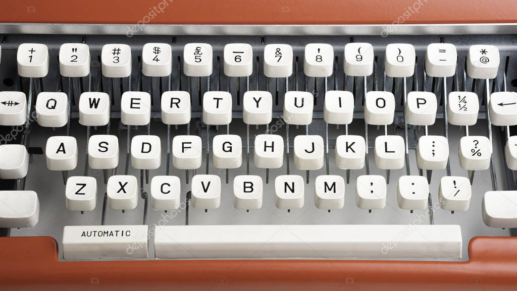 Portable Manual Typewriter In Red Orange