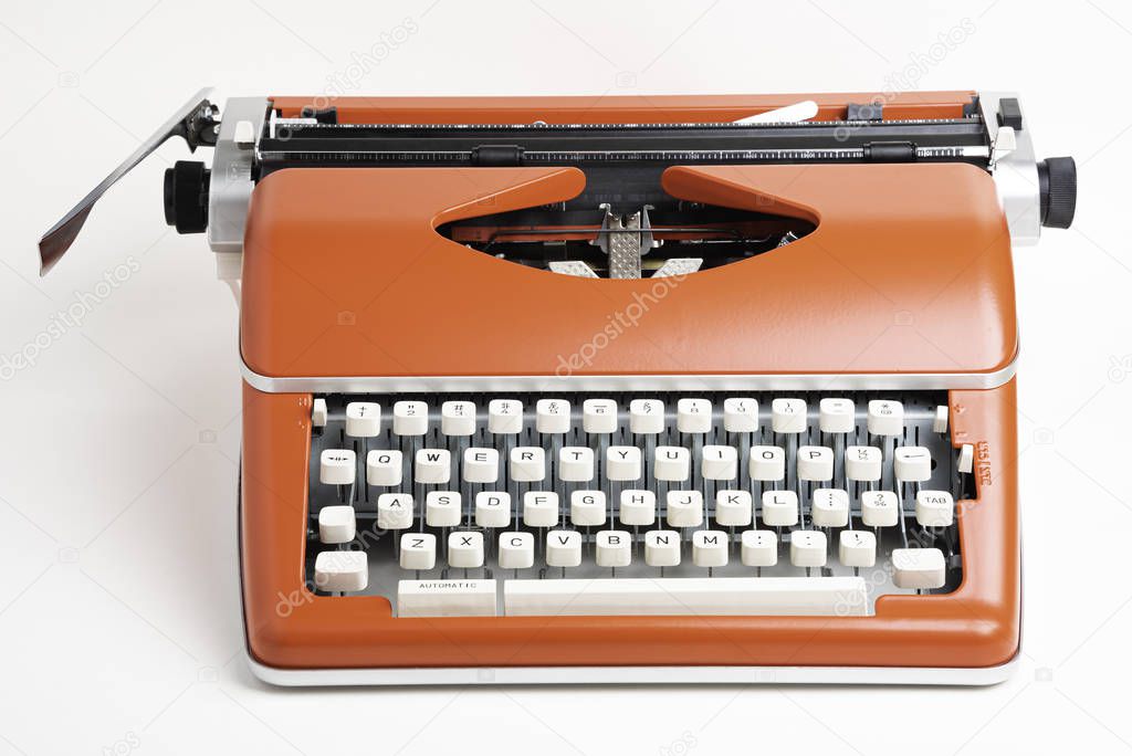 Portable Manual Typewriter In Red Orange