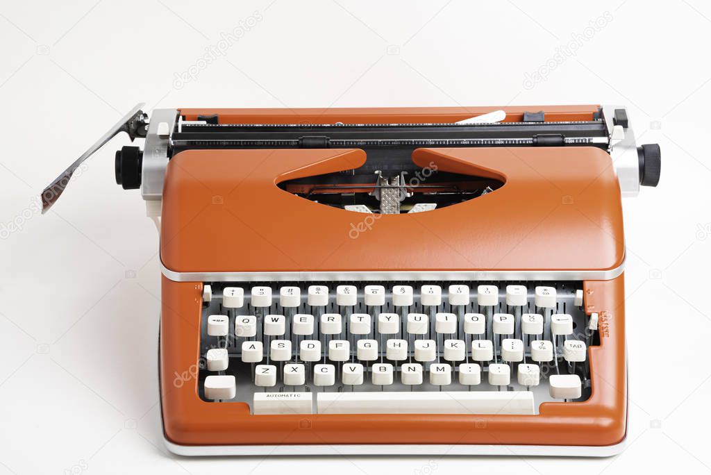 Portable Manual Typewriter In Red Orange