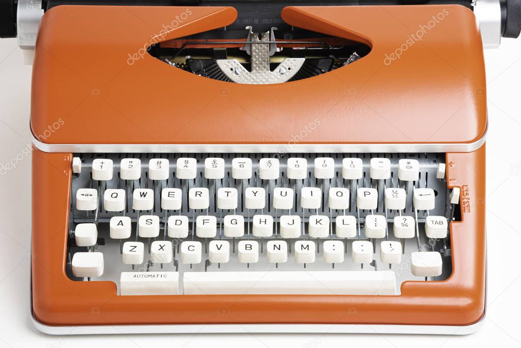 Portable Manual Typewriter In Red Orange