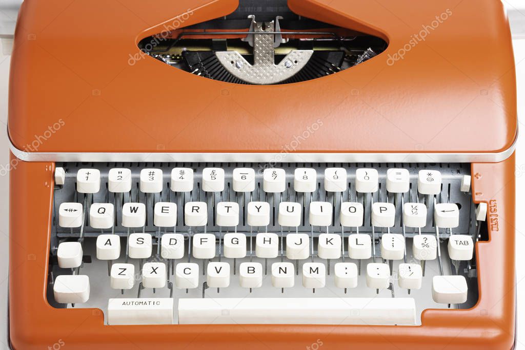 Portable Manual Typewriter In Red Orange