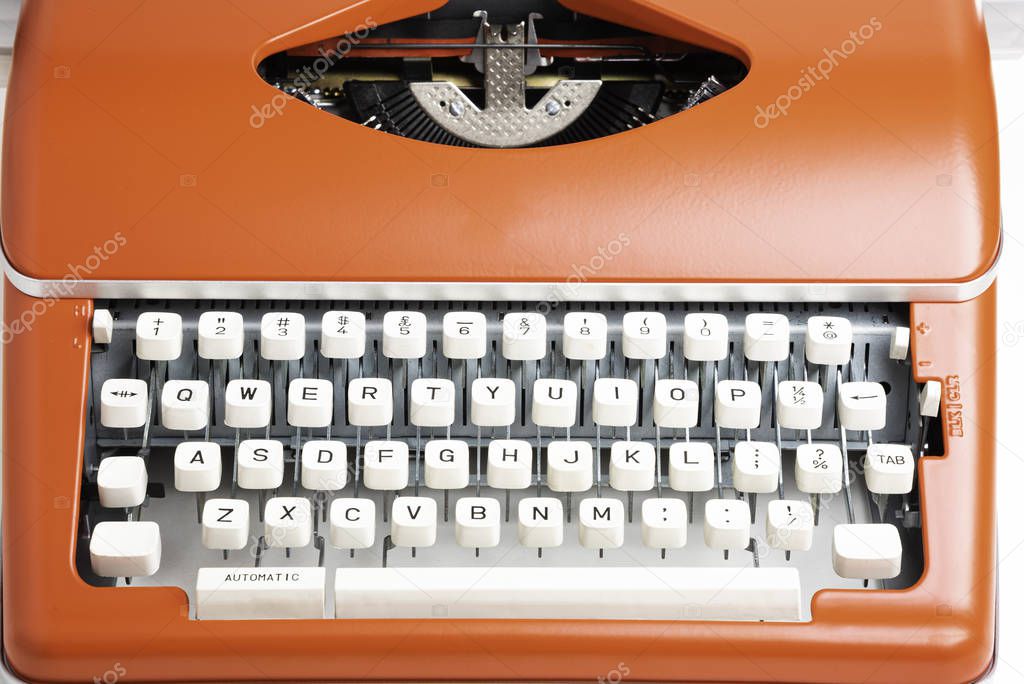 Portable Manual Typewriter In Red Orange