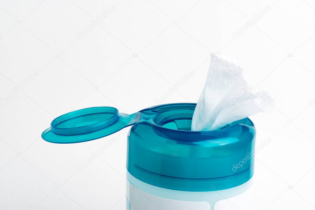 A close-up shot of an open aquamarine push top cap of a disinfectant wet wipes plastic container set on a plain white background.