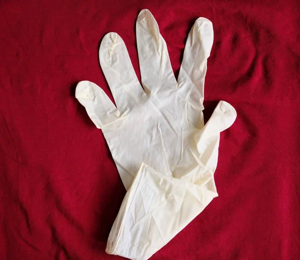 Gants Blancs Latex Sur Fond Rouge Protection Des Mains Contre — Photo