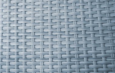 Hasır şeritlerin soyut arkaplanı. Doku ve desenler el yapımı. Dış mobilyalar yakın plan..