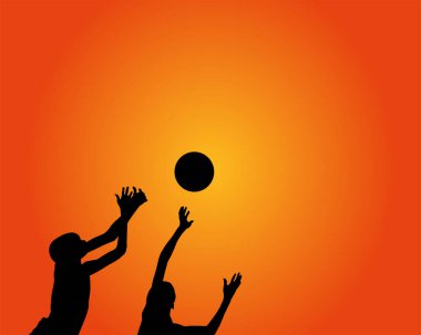 Basketbol oynayan iki çocuk.