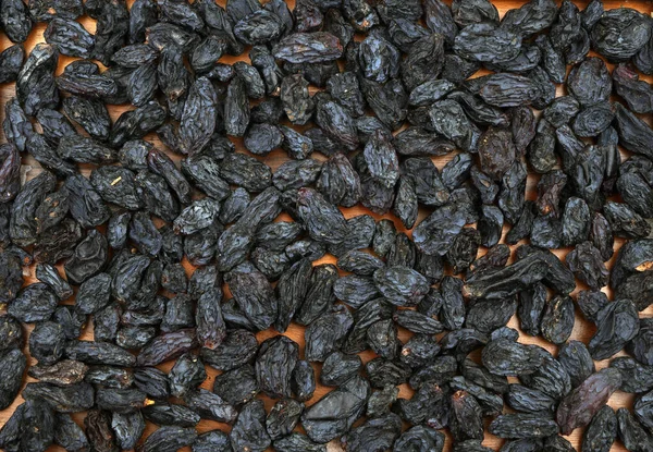 Organic big black raisins. For texture or background.