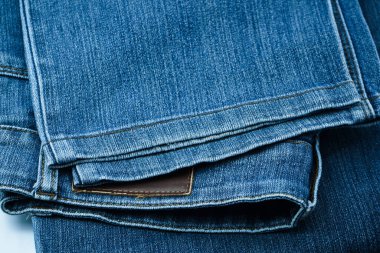 Koyu mavi kot pantolon desenini kapat. Blue Jeans desen-gri arkaplan.                                