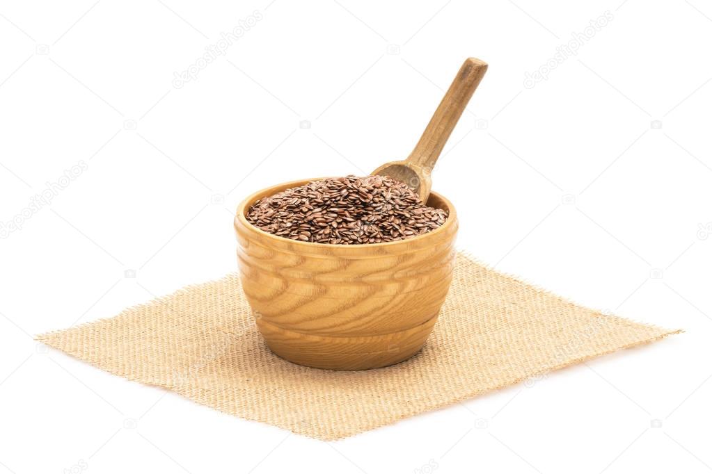 Linseeds in a wooden bowl