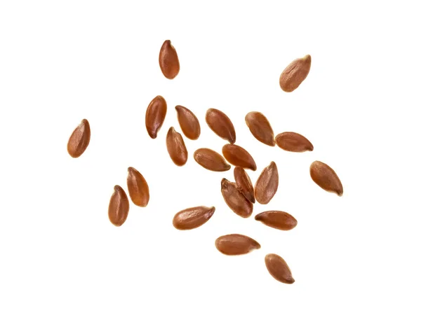 Linseeds spread out on white — Stock Photo, Image