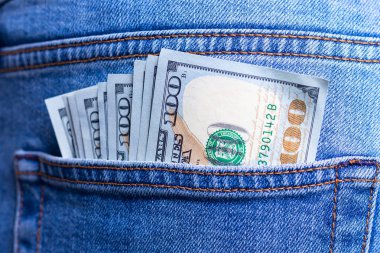 Money in the pocket of a successful man