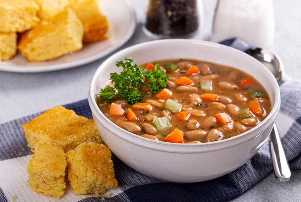 Closeup Tasty Bean Soup Carrots Celery White Bowl Corn Bread — Stock Photo, Image