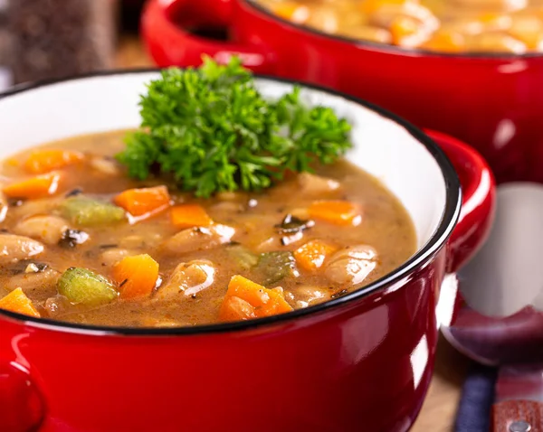 Closeup Bean Soup Carrots Celery Red Bowl — Stock Photo, Image