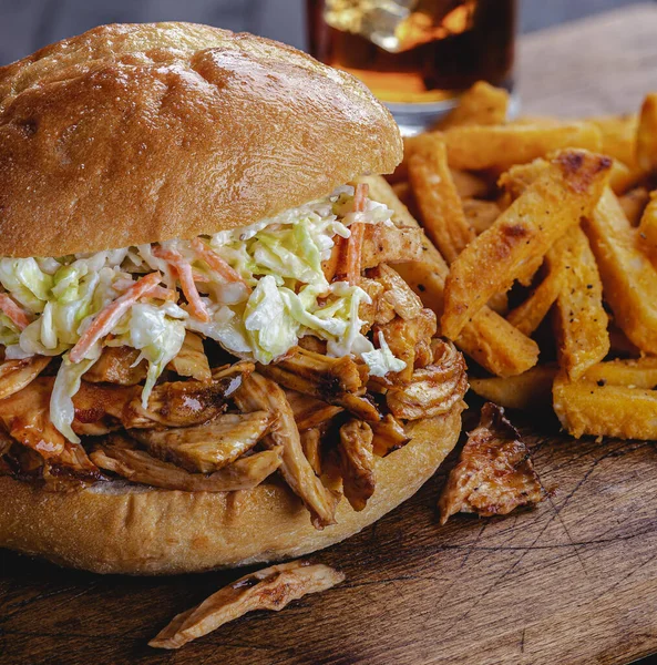 Closeup Barbecue Chicken Sandwich Coleslaw Bun French Fries Background Rustic — Stock Photo, Image