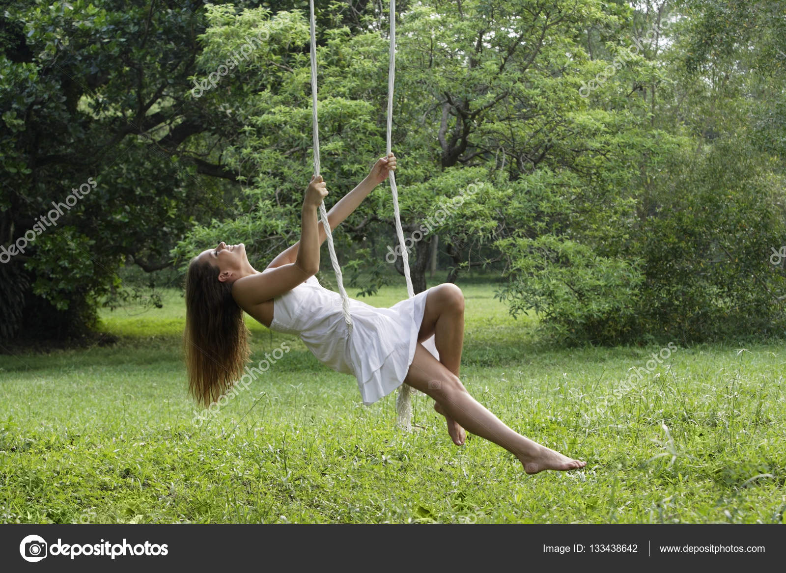 https://st3.depositphotos.com/2492691/13343/i/1600/depositphotos_133438642-stock-photo-woman-in-white-dress-swinging.jpg