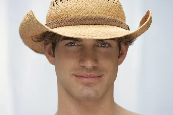 young man wearing hat