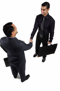 İş adamları el sıkışıyor