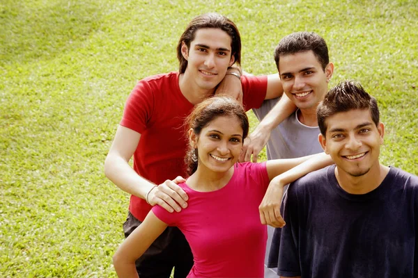 Young adults standing together — Stock Photo, Image