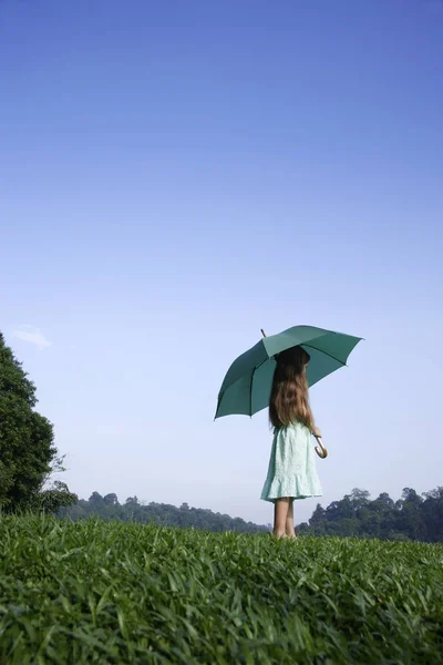 girl with big umbrella