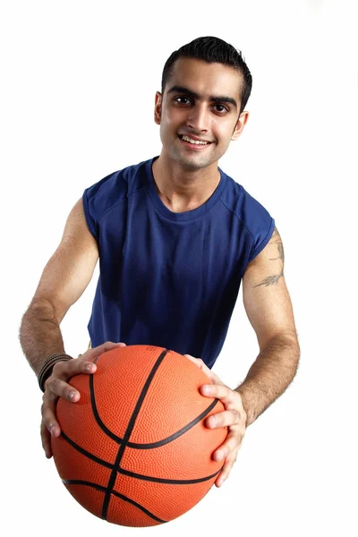 Man holding basketball — Stock Photo, Image