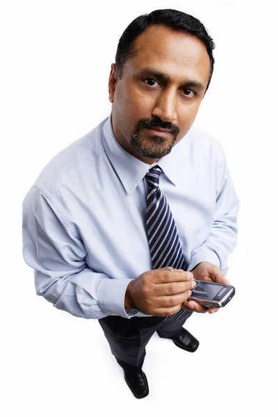 Businessman using PDA — Stock Photo, Image