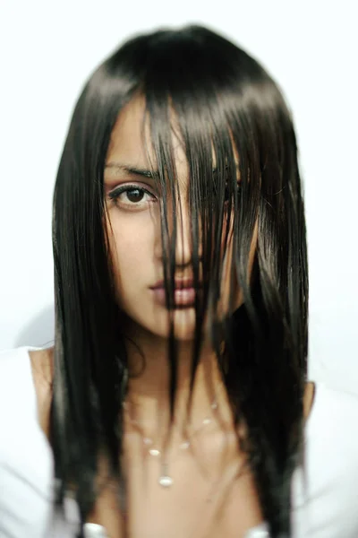 Young woman with long wet hair — Stock Photo, Image