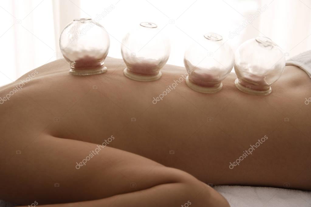 suction cup treatment on female back