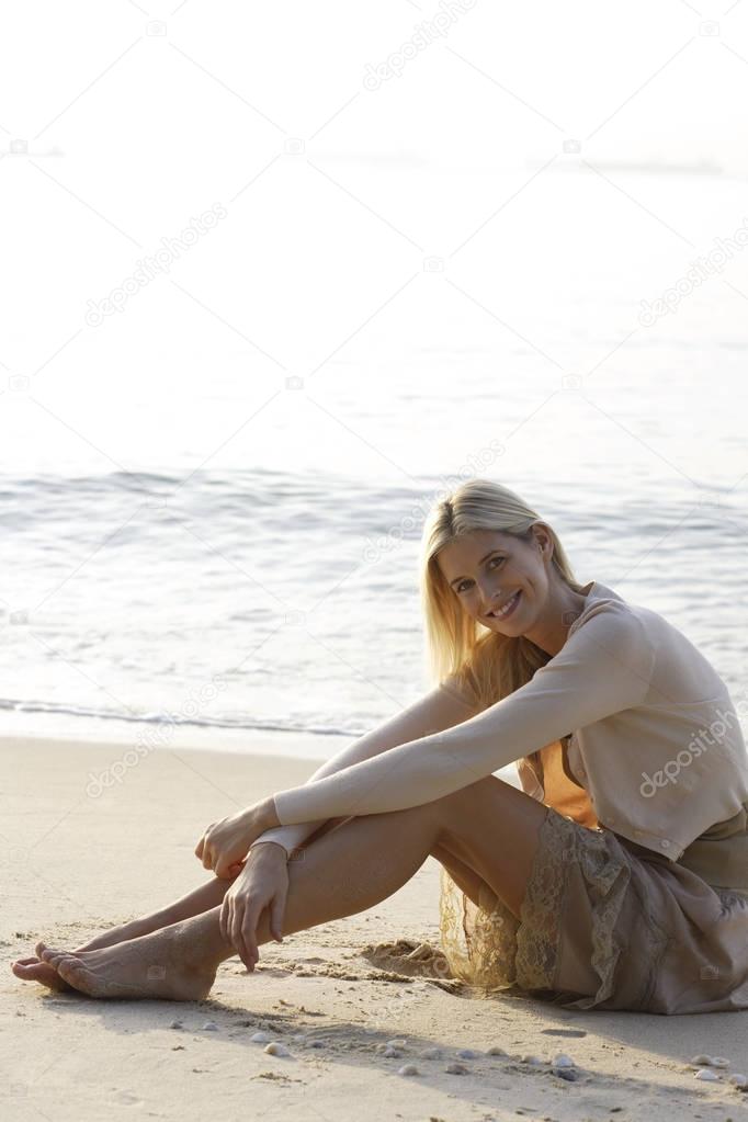 woman relaxig on beach