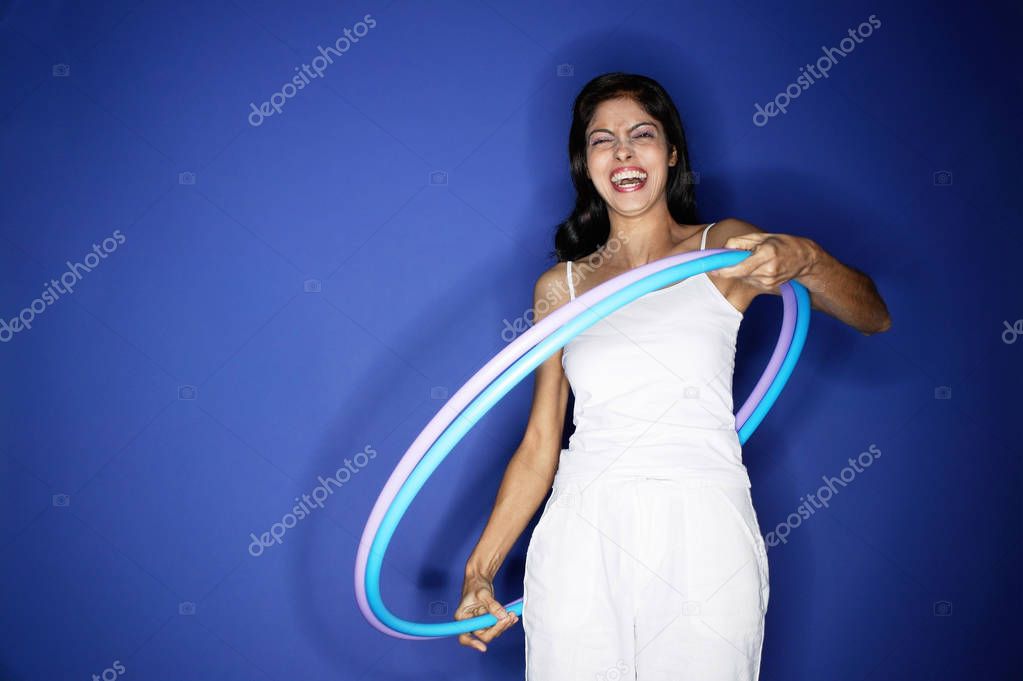 Woman with hoola hoop