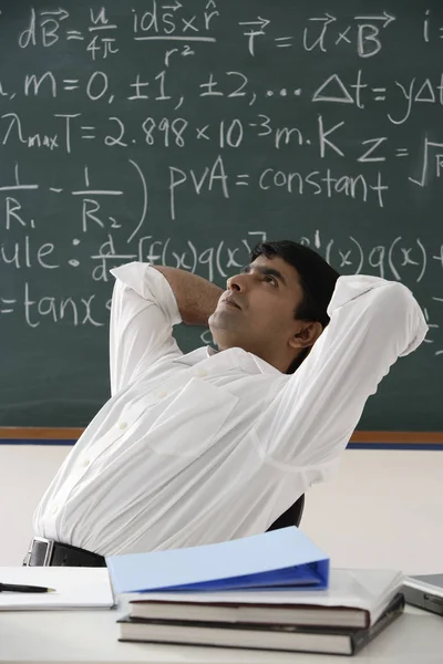 Male teacher in classroom — Stock Photo, Image