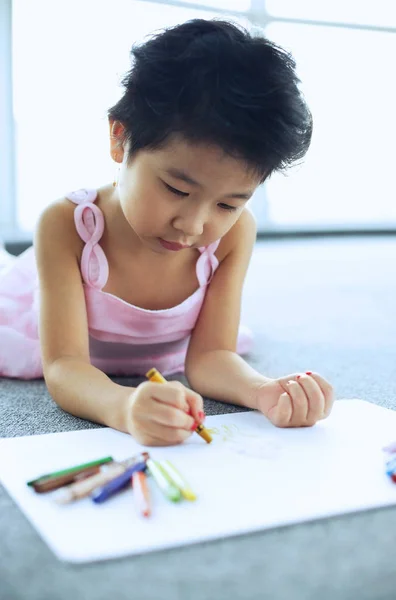 Young girl drawing Stock Image