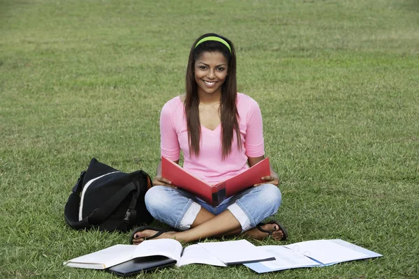 Young woman studying outside Stock Photo