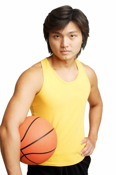 Man with basketball under arm — Stock Photo, Image