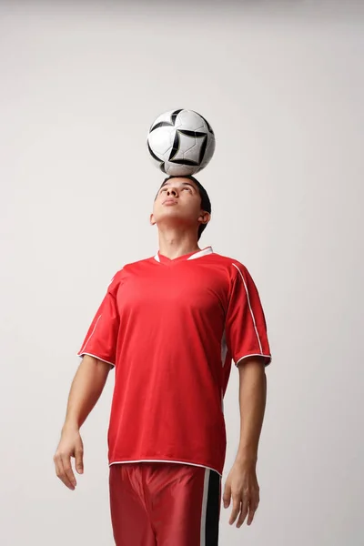 Homem de uniforme de futebol — Fotografia de Stock