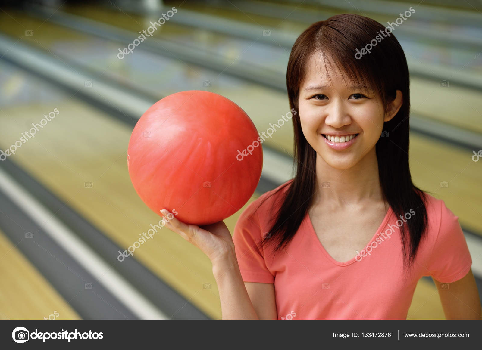 Woman with bowling ball Stock Photo by ©MicrostockAsia 133472876