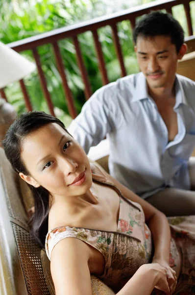 Couple sitting together — Stock Photo, Image