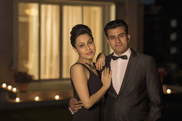 Man and woman in evening wear — Stock Photo, Image