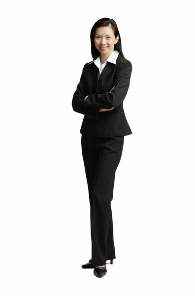 Femme d'affaires debout avec les bras croisés — Photo